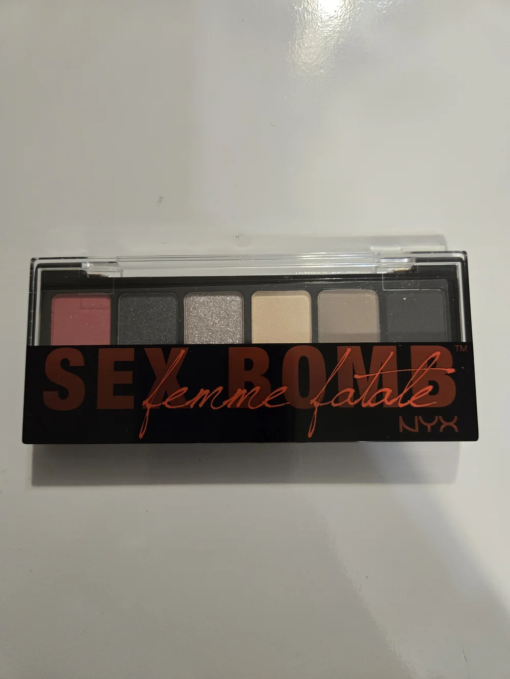NYX Eye Shadow Palette — Black, Silver, Champagne, Taupe